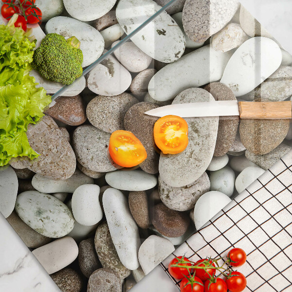 Deska do krojenia Tło małe kamienie