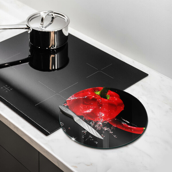 Deska kuchenna szklana Czerwone papryki w wodzie