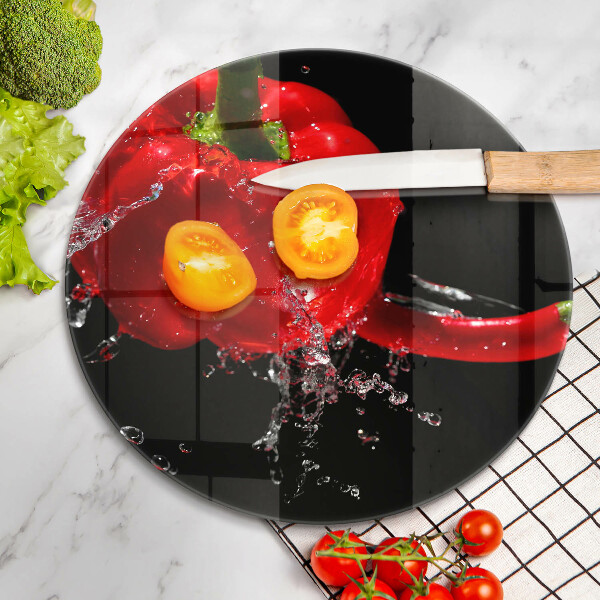 Deska kuchenna szklana Czerwone papryki w wodzie