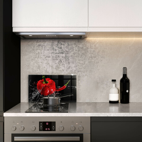 Osłona ściany przy kuchence gazowej Czerwone papryki w wodzie