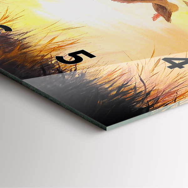 Kwadratowy zegar Żurawie o zachodzie słońca