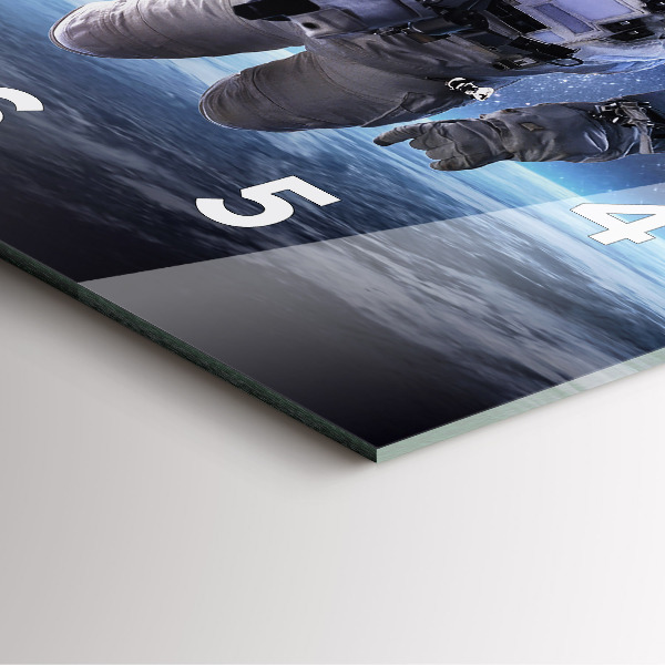 Zegar na ścianę kwadratowy Astronauta nad ziemią