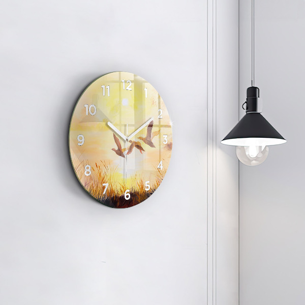 Zegar okrągły Żurawie o zachodzie słońca