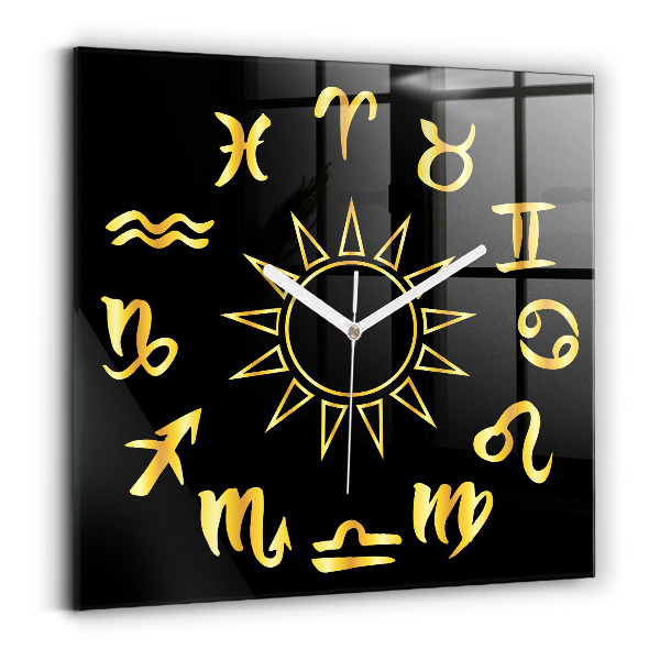 Zegar ścienny nowoczesny Złote znaki astrologiczne na czarnym tle.